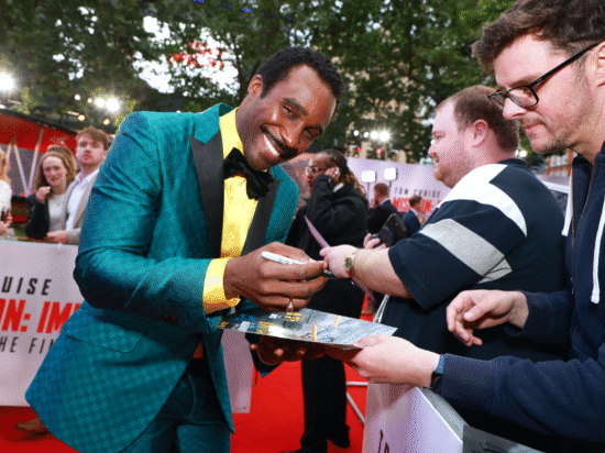 Tramell Tillman Signs Fan Photos at MI8 Premiere Courtesy Parmount
